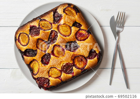 Delicious juicy plum cake Delicious juicy plum cake 69502116