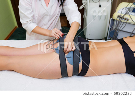 Myostimulation of the mouse on the buttocks. 69502283