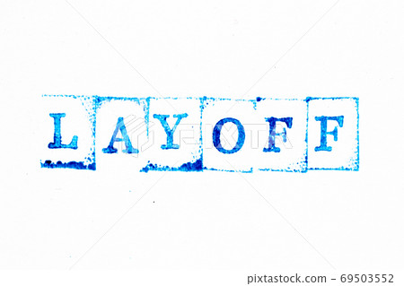 Blue color ink of rubber stamp in word layoff on white paper background 69503552