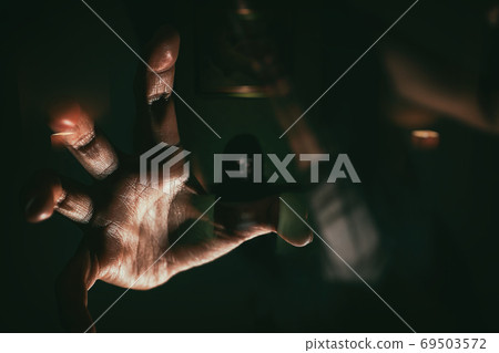 blurry image double exposure ghost woman hand in haunted hotel with dark filter, halloween concept blurry image double exposure ghost woman hand in haunted hotel with dark filter, halloween concept 69503572
