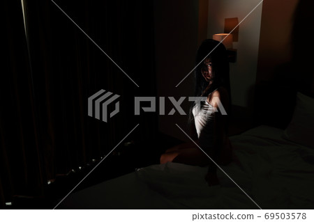 ghost woman in haunted hotel with dark filter, halloween concept ghost woman in haunted hotel with dark filter, halloween concept 69503578