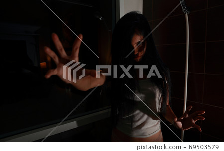 ghost woman in haunted hotel with dark filter, halloween concept ghost woman in haunted hotel with dark filter, halloween concept 69503579