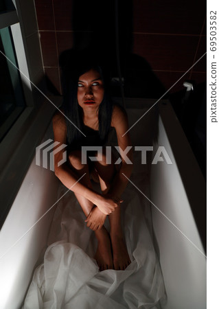 full length ghost woman in haunted hotel with dark filter, halloween concept full length ghost woman in haunted hotel with dark filter, halloween concept 69503582