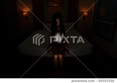 ghost woman in haunted hotel with dark filter, halloween concept 69503588