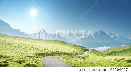 Grindelwald valley from the top of First mountain, Switzerland 69504097