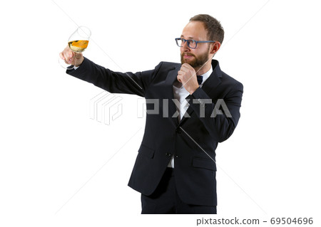 Portrait of male sommelier in suit isolated over white background Portrait of male sommelier in suit isolated over white background 69504696