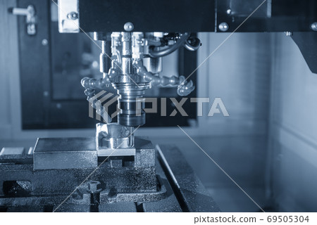The  CNC  milling machine cutting  the mold parts. 69505304