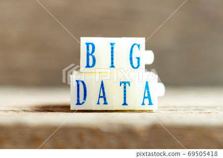 Letter block with blue color word big data on wood background 69505418