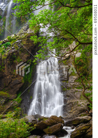 Khlong Lan Waterfall, the beautiful waterfall in deep forest at Khlong Lan National Park ,Kamphaeng Phet, Thailand 69508011
