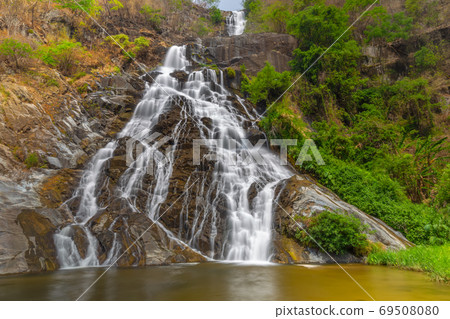 Tao Dam waterfall, the beautiful waterfall in deep forest at Klong Wang Chao national park ,Kamphaeng Phet, Thailand Tao Dam waterfall, the beautiful waterfall in deep forest at Klong Wang Chao national park ,Kamphaeng Phet, Thailand 69508080