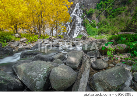 Tao Dam waterfall, the beautiful waterfall in deep forest at Klong Wang Chao national park ,Kamphaeng Phet, Thailand Tao Dam waterfall, the beautiful waterfall in deep forest at Klong Wang Chao national park ,Kamphaeng Phet, Thailand 69508093