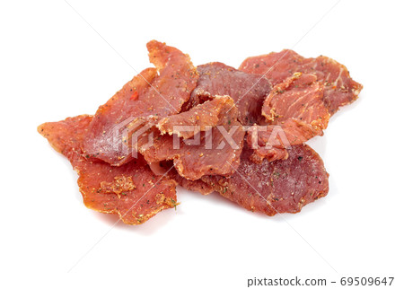 Spicy dry-cured meat isolated on a white background. Spicy dry-cured meat isolated on a white background. 69509647