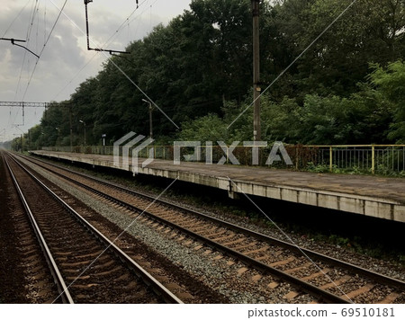 Railway suburban empty platform for commuter trains. Train quarantine 69510181