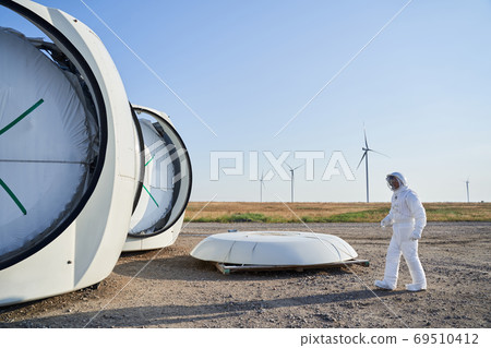 Spaceman walking near star station 69510412