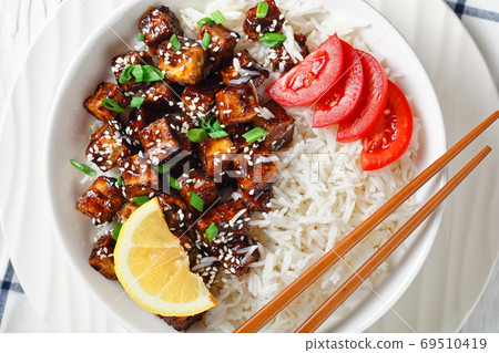 Teriyaki baked tofu with rice, top view, flat lay 69510419