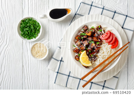 Teriyaki baked tofu with rice, top view, flat lay 69510420