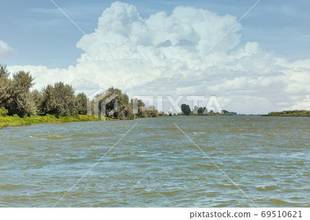 Danube river with clouds in Vilkove, Ukraine. 69510621