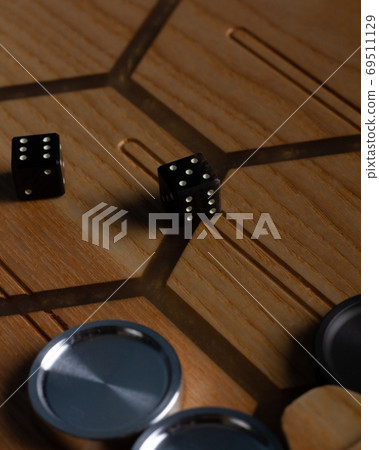 Color detail of a Backgammon game with two dice close up. Color detail of a Backgammon game with two dice close up. 69511129