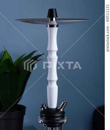 part of the hookah, modern design, on a background. part of the hookah, modern design, on a background. 69511131