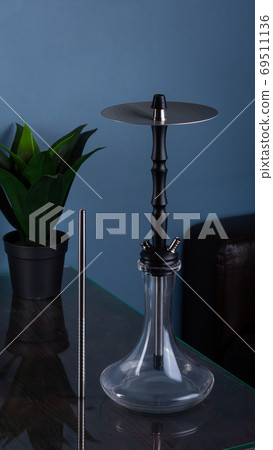 part of the hookah, modern design, on a background. part of the hookah, modern design, on a background. 69511136