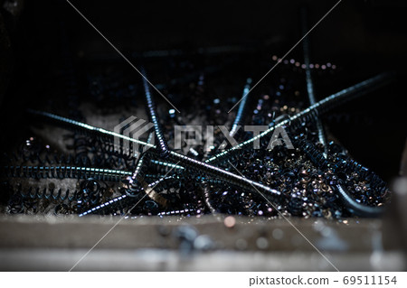 Chips produced by lathe processing Chips produced by lathe processing 69511154