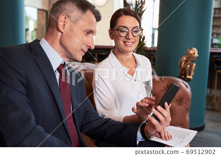 Waist up portrait of advisor and her assistant Waist up portrait of advisor and her assistant 69512902