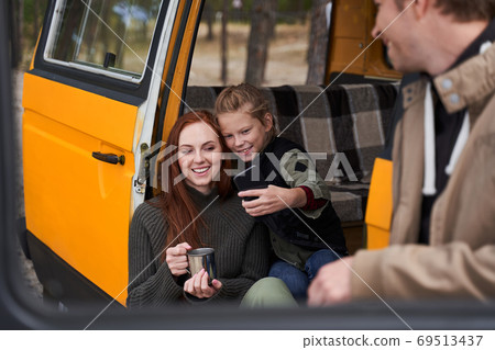 Girl making selfie with her mother 69513437