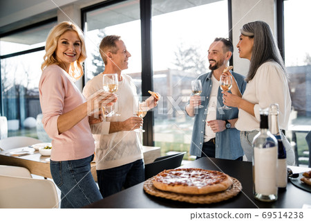 Pretty woman spending time with her friends Pretty woman spending time with her friends 69514238