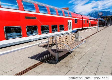 Outdoor empty passenger seat at train station in Fussen Germany Outdoor empty passenger seat at train station in Fussen Germany 69515360