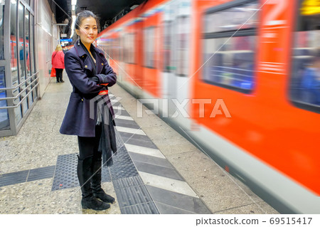 Young woman in Train Station 69515417