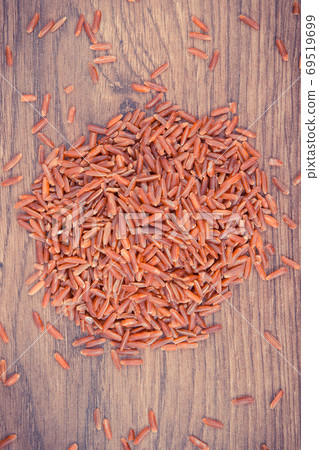 Vintage photo, Heap of red rice, healthy nutrition Vintage photo, Heap of red rice, healthy nutrition 69519699
