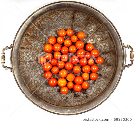 Red Cherry Tomatoes On A Vintage Tray 69520300
