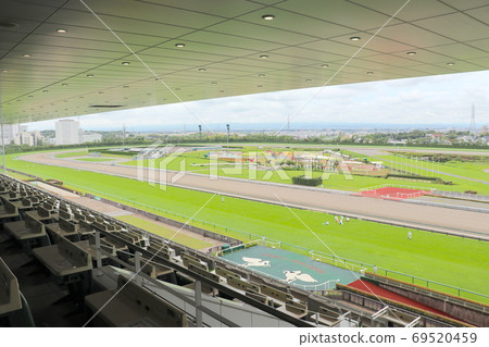 Horse racing held by no spectators Horse racing held by no spectators 69520459