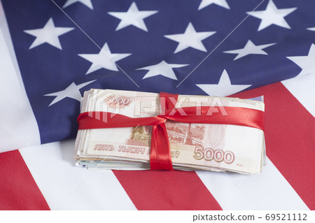 Five thousands rubles on American flag background Five thousands rubles on American flag background 69521112