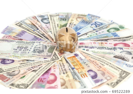 Golden piggy bank with International currencies 69522289