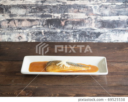 Boiled mackerel in miso. Japanese food made by boiling mackerel in miso. Boiled mackerel in miso. Japanese food made by boiling mackerel in miso. 69525538