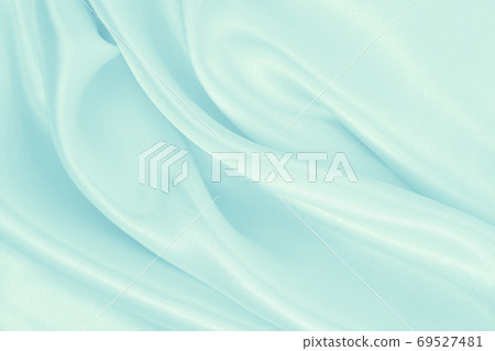Smooth elegant blue silk or satin luxury cloth texture as abstra 69527481