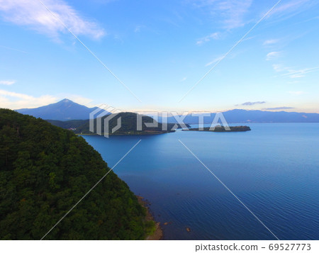 Lake Inawashiro at dusk-Aerial view with drone (Akaji mansion in Minato Town, Aizuwakamatsu City, Fukushima Prefecture) 69527773