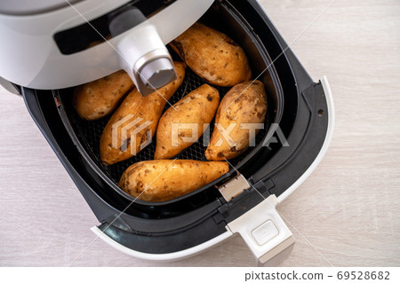 Roasted sweet potato cooked by airfryer at home. Healthy food for diet eating. 69528682