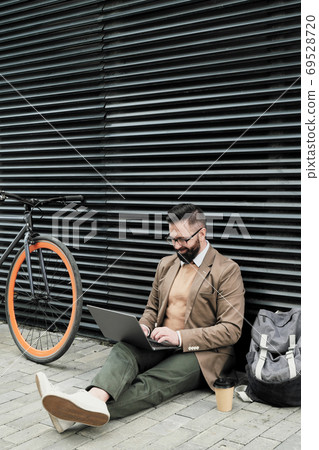 Man working online Man working online 69528720