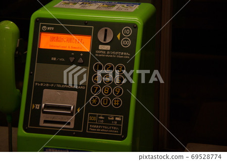 Public phone at night Public phone at night 69528774