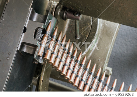 training cartridges from the machine gun in the tape are inserted 69529268