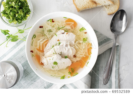 chicken soup with noodles and herbs chicken soup with noodles and herbs 69532589