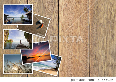 Photos stack on vintage grunge wooden background 69533986