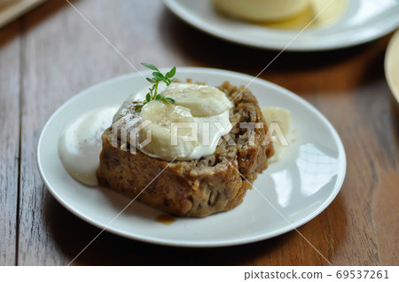 cake or banana cakewith cream cake or banana cakewith cream 69537261