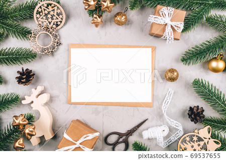 Christmas composition of fir tree branches and decorations. Christmas composition of fir tree branches and decorations. 69537655
