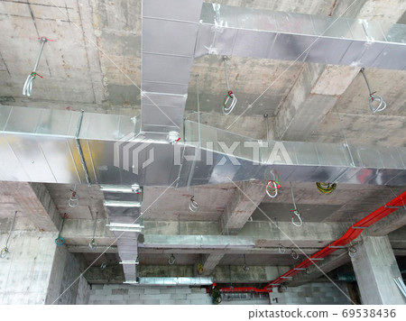 KUALA LUMPUR, MALAYSIA - AUGUST 31, 2019: Air-condition and ventilation duct under construction at the construction site. Distributing cool air and control the room's temperature.   69538436