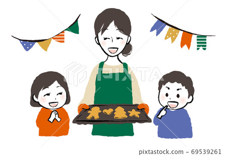 Parents and children baking Christmas cookies 69539261