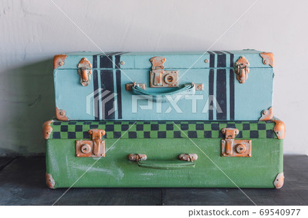 A pair of old vintage colored suitcases, trunks, A pair of old vintage colored suitcases, trunks, 69540977