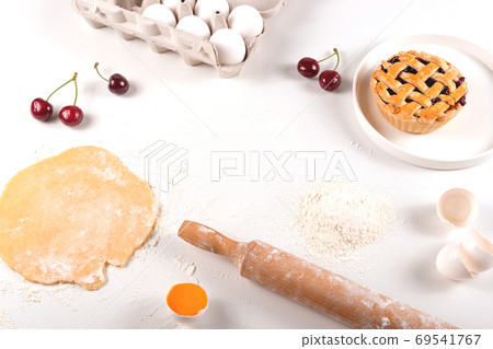 Cooking homemade mini cherry pie - autumn food concept Cooking homemade mini cherry pie - autumn food concept 69541767